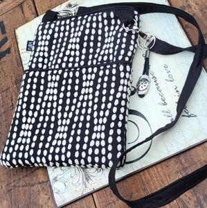 Varu, handcrafted, custom crossbody bag with silver accents, Like new!